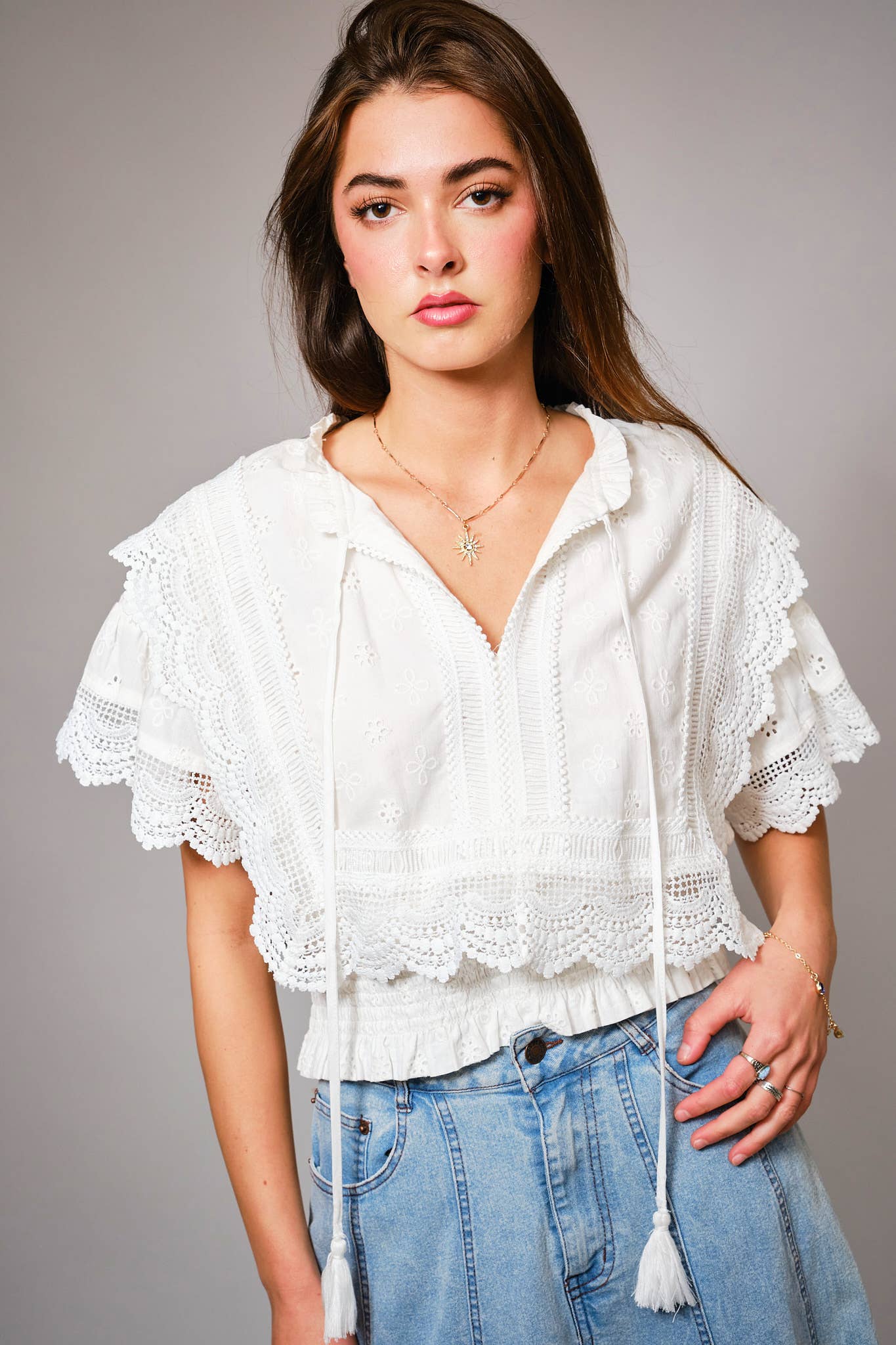 36900T - Eyelet Embroidered Tassel Tie Front Crop Top