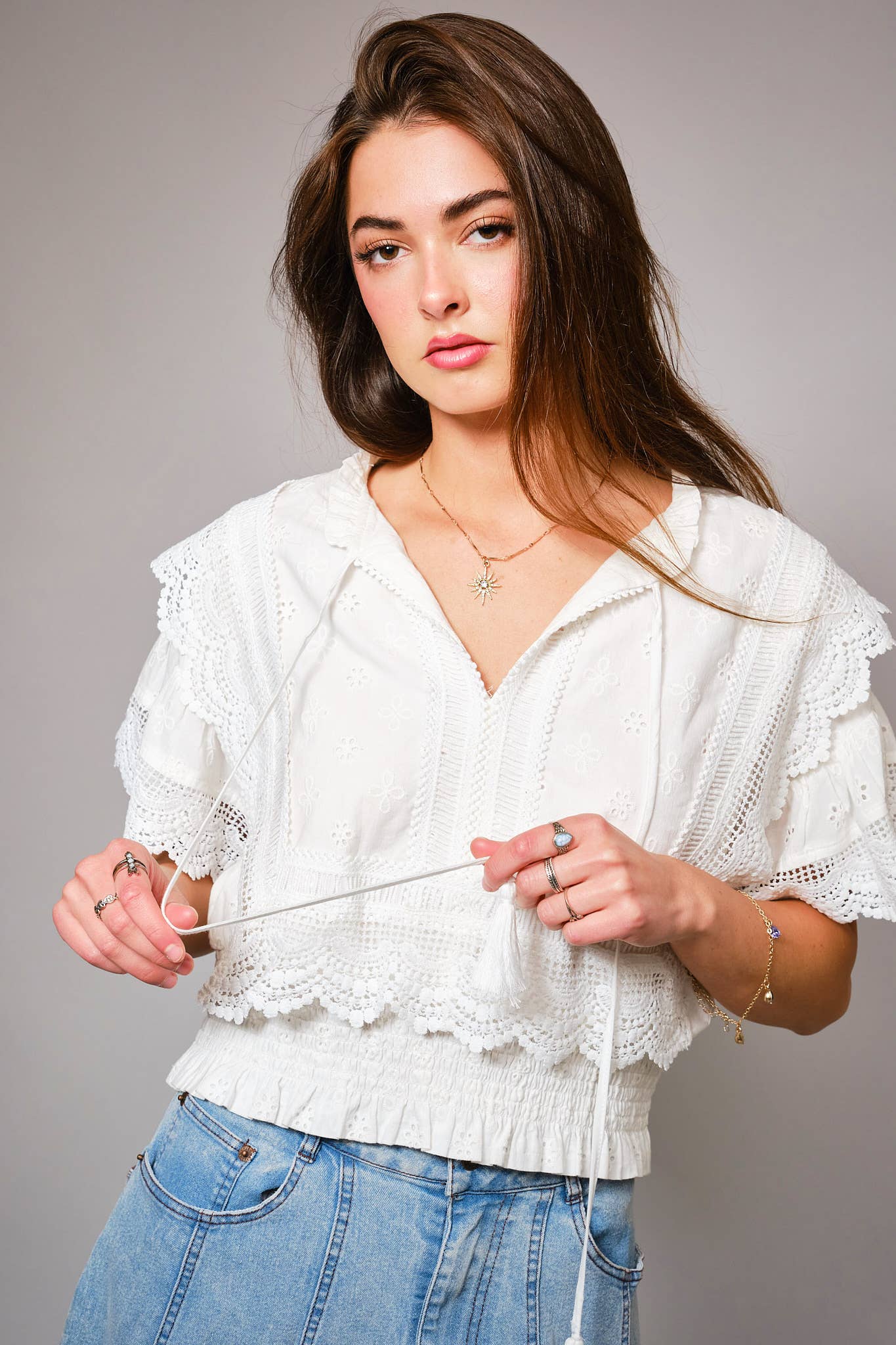 36900T - Eyelet Embroidered Tassel Tie Front Crop Top