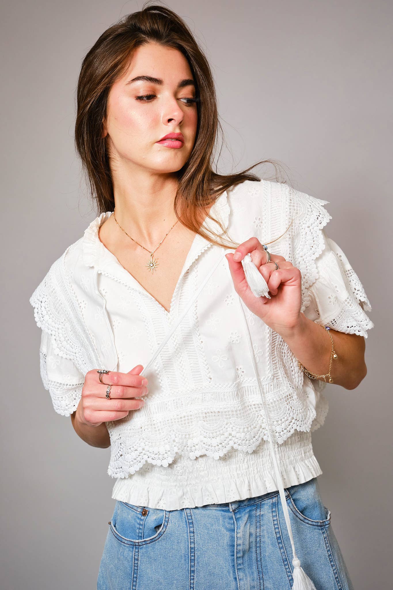 36900T - Eyelet Embroidered Tassel Tie Front Crop Top