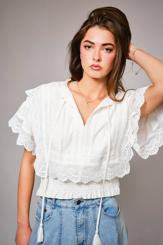 36900T - Eyelet Embroidered Tassel Tie Front Crop Top